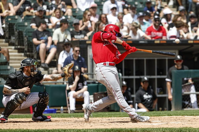 May 31, 2023; Chicago, IL, USA; Los Angeles Angels first baseman Jared Walsh (20) hits two in the third inning against the Chicago White Sox at guaranteed pitch Hit a double.